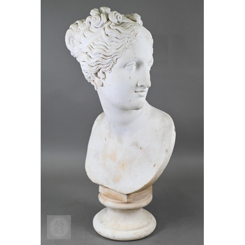 888 - An antique white marble bust of a classical female with ornate hair, on socle base, 62cm high