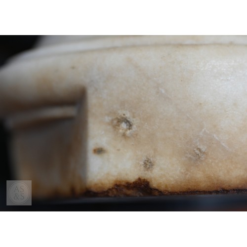 888 - An antique white marble bust of a classical female with ornate hair, on socle base, 62cm high