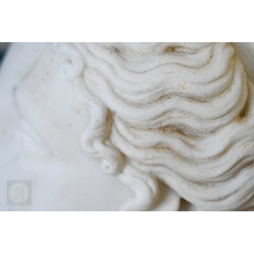 888 - An antique white marble bust of a classical female with ornate hair, on socle base, 62cm high