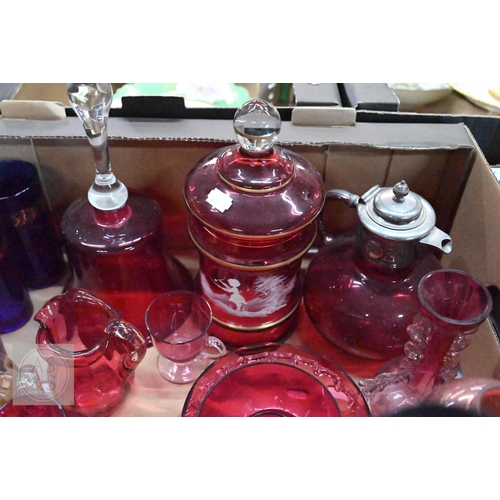 425 - A Victorian cranberry glass claret jug with engraved electroplated collar, cover and handle, to/w a ... 