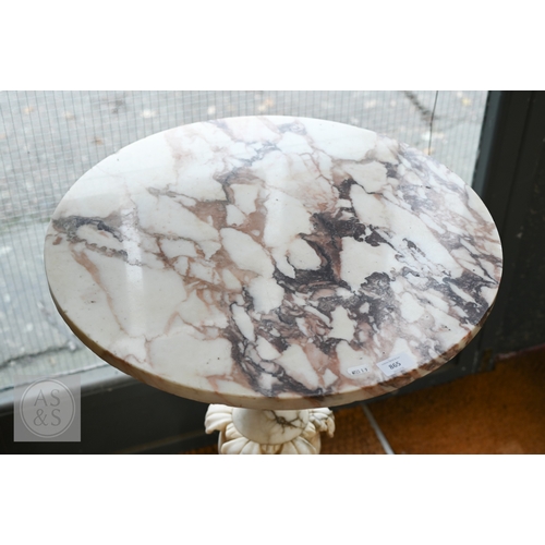 27 - An Italian carved marble table, 19th century, the polished circular top raised on a foliate carved b... 