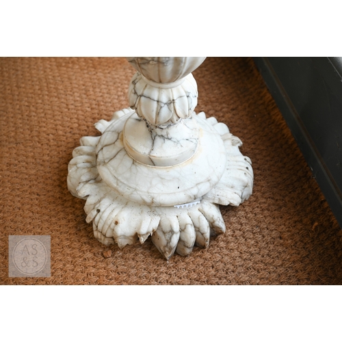 27 - An Italian carved marble table, 19th century, the polished circular top raised on a foliate carved b... 