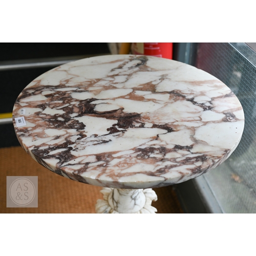 27 - An Italian carved marble table, 19th century, the polished circular top raised on a foliate carved b... 