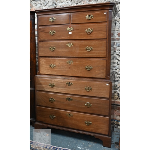 32 - A George III mahogany chest on chest, the moulded cornice with canted corners over two short and thr... 