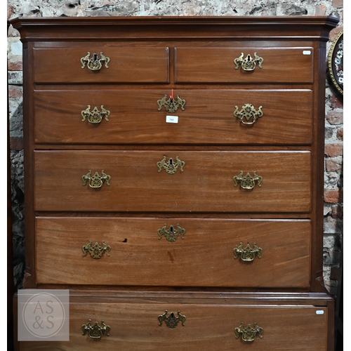 32 - A George III mahogany chest on chest, the moulded cornice with canted corners over two short and thr... 