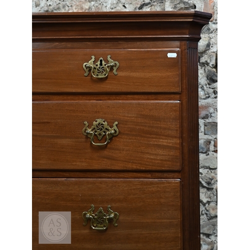 32 - A George III mahogany chest on chest, the moulded cornice with canted corners over two short and thr... 