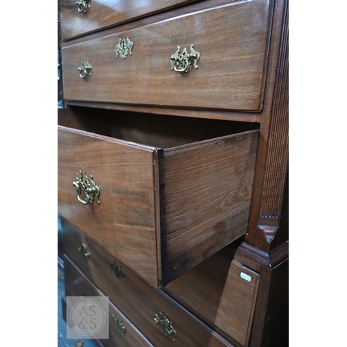 32 - A George III mahogany chest on chest, the moulded cornice with canted corners over two short and thr... 