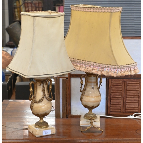 122 - A pair of turned marble table lamps with gilt metal mounts, 28 cm to top of body (2)