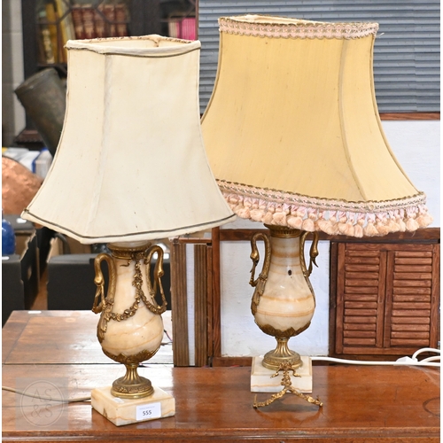 122 - A pair of turned marble table lamps with gilt metal mounts, 28 cm to top of body (2)