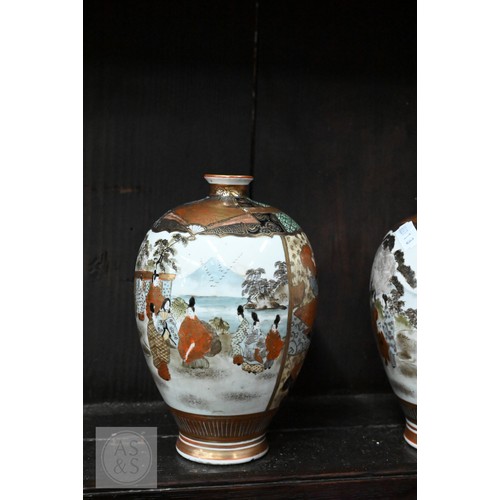 546 - A collection of Japanese Kutani cabinet china including a pair of ovoid vases painted and gilded wit... 