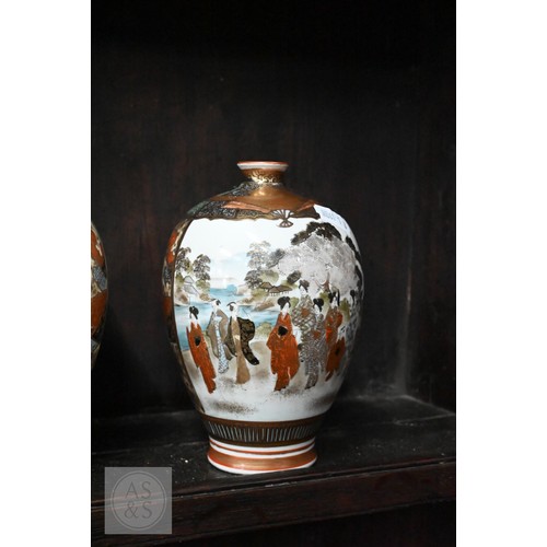 546 - A collection of Japanese Kutani cabinet china including a pair of ovoid vases painted and gilded wit... 