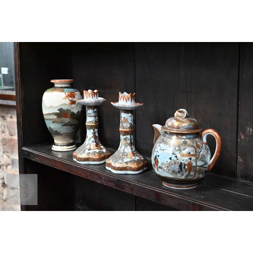 546 - A collection of Japanese Kutani cabinet china including a pair of ovoid vases painted and gilded wit... 