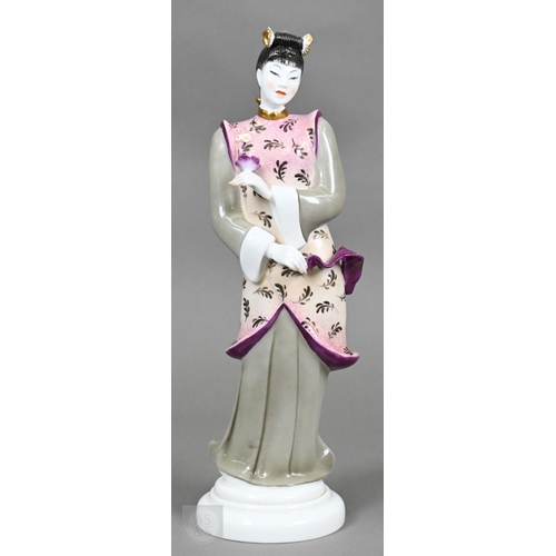 552 - A Royal Worcester figure of a Chinese lady, designed by Pinder Davis, no. 3419, 1956, 31cm high