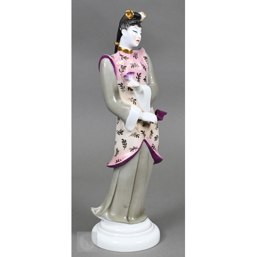 552 - A Royal Worcester figure of a Chinese lady, designed by Pinder Davis, no. 3419, 1956, 31cm high