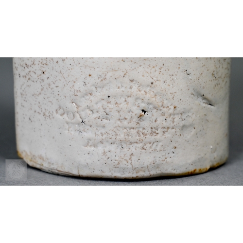 553 - An early 19th Century commemorative stoneware flask, modelled as Lord Brougham, holding the Reform B... 