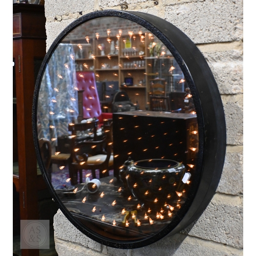569 - A contemporary design circular 'Infinity' or 'Rabbit-Hole' mirror with painted frame and internal re... 