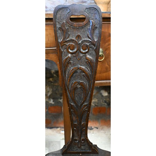 275 - # A late 19th century carved oak Welsh spinning chairs on barleytwist legs