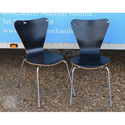 10 - A set of ten black faced laminated plywood stacking chairs, with chrome legs (10)