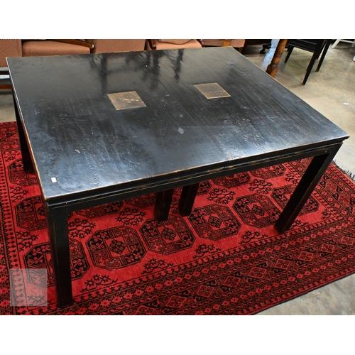 132 - A substantial Chinese black painted extending dining table with four optional leaves, each section i... 