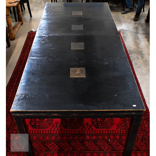 132 - A substantial Chinese black painted extending dining table with four optional leaves, each section i... 