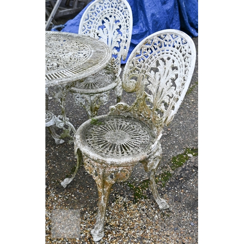 15 - A weathered Victorian style cast alloy terrace breakfast set, comprising a circular table and four c... 