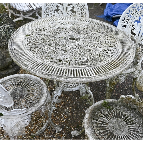 15 - A weathered Victorian style cast alloy terrace breakfast set, comprising a circular table and four c... 