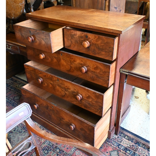 208 - A Victorian flame mahogany chest of two short over three long drawers with turned handles and plinth... 
