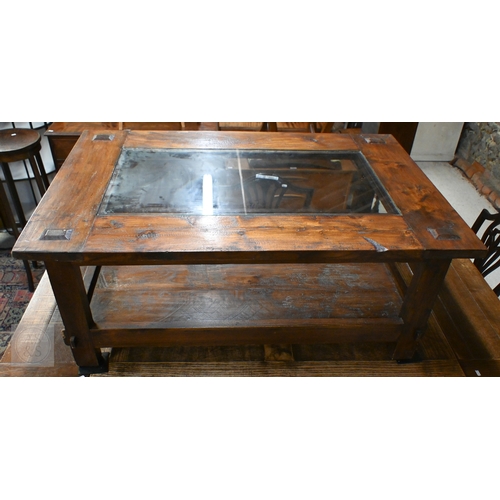 216 - A Lombok rustic-stained hardwood two-tier coffee table with inset glass top, 120 x 80 x 50 cm high