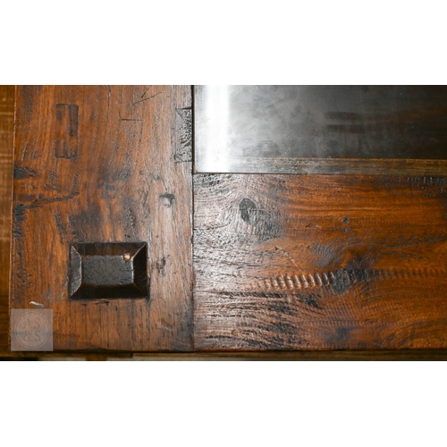 216 - A Lombok rustic-stained hardwood two-tier coffee table with inset glass top, 120 x 80 x 50 cm high