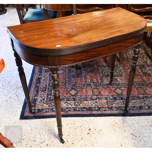 224 - A Victorian mahogany demi-lune folding tea table on turned legs with casters, 90 x 45 x 77 cm high (... 