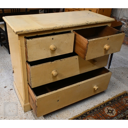 225 - An antique cream painted chest of two short over two long drawers with turned handles (one missing),... 