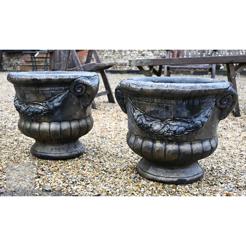 23 - A pair of Georgian style cast composite faux lead finished planters with rams head decoration (2)
