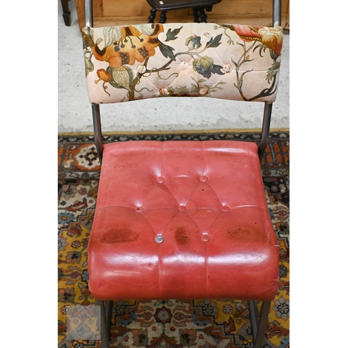 240 - A set of four tubular steel stacking chairs with buttoned pink vinyl and floral fabric upholstery (4... 