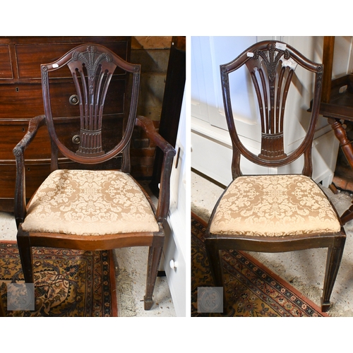 259 - A 19th century Hepplewhite style mahogany shield back carver chair with gold damask pad seat, to/w a... 