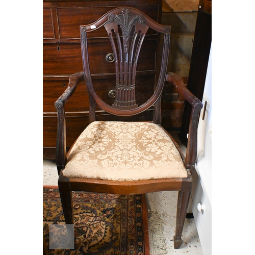 259 - A 19th century Hepplewhite style mahogany shield back carver chair with gold damask pad seat, to/w a... 