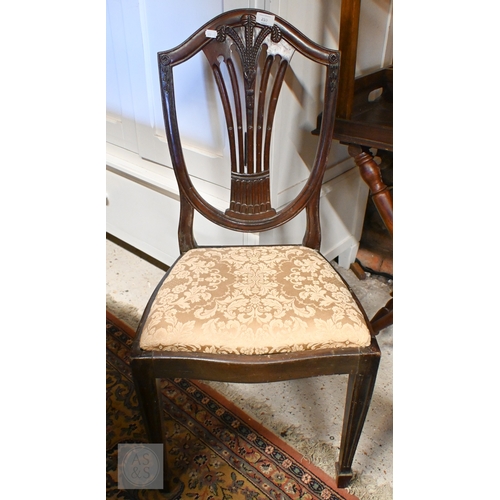 259 - A 19th century Hepplewhite style mahogany shield back carver chair with gold damask pad seat, to/w a... 