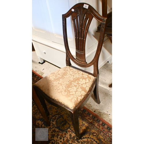 259 - A 19th century Hepplewhite style mahogany shield back carver chair with gold damask pad seat, to/w a... 