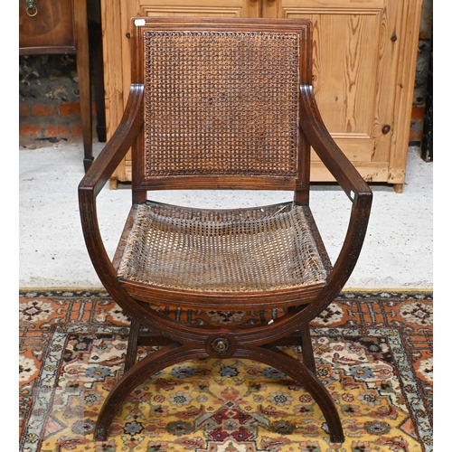 263 - A Regency mahogany elbow chair with caned back and seat a/f