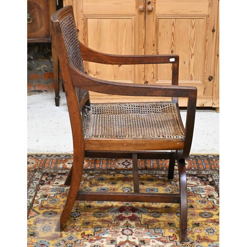 263 - A Regency mahogany elbow chair with caned back and seat a/f
