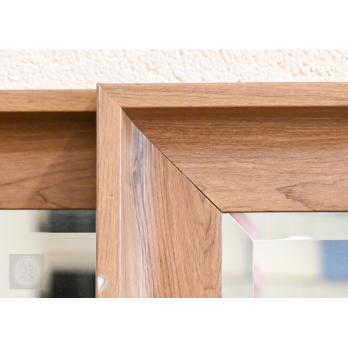 371 - A pair of modern bevelled mirrors in lightly stained moulded hardwood frames, 104 x 72 cm (2)