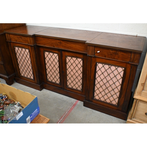 373 - A 19th century mahogany inverted breakfront credenza with three drawers over lattice work and pleate... 