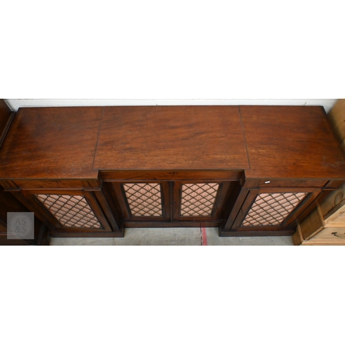 373 - A 19th century mahogany inverted breakfront credenza with three drawers over lattice work and pleate... 