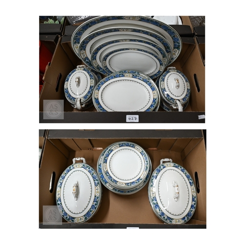 427 - A Royal Doulton pottery dinner service, fifty two pieces including covers (2 boxes)