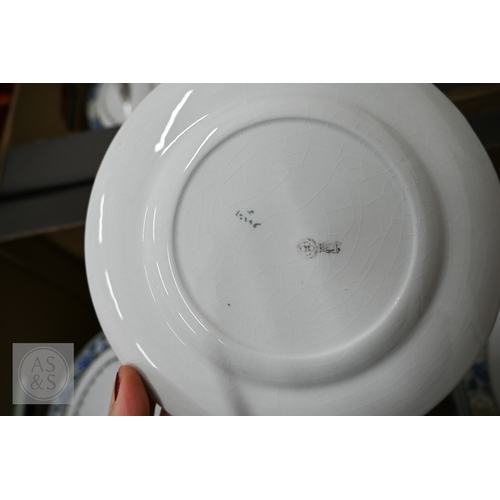 427 - A Royal Doulton pottery dinner service, fifty two pieces including covers (2 boxes)