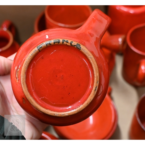 428 - A selection of Wedgwood Queen's Ware tableware, to/w various French red-glazed coffee ware, includin... 
