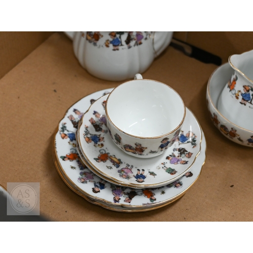 430 - # A Crown Staffordshire coffee service, to/w a nursery tea set (box)