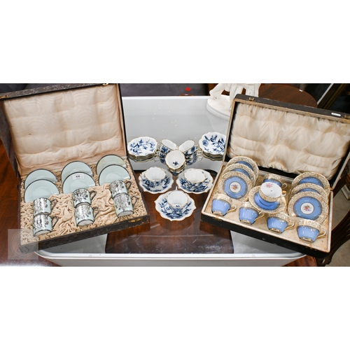 435 - A cased set of six Limoges coffee cans and saucers with silver overlays and a cased set of six Copel... 