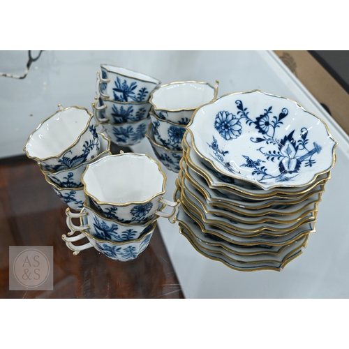 435 - A cased set of six Limoges coffee cans and saucers with silver overlays and a cased set of six Copel... 