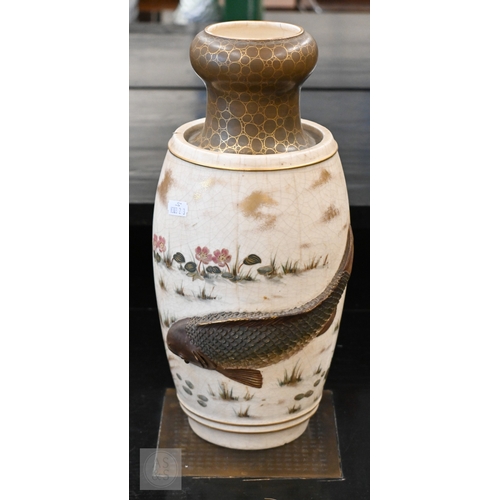 449 - A Japanese Meiji era pottery vase, relief-moulded with a carp leaping from a painted pond, with gild... 
