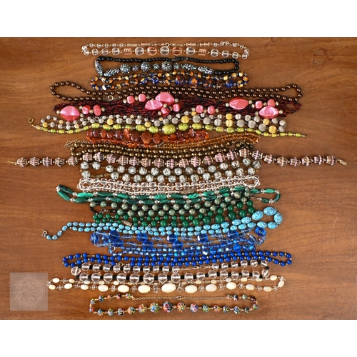 454 - A selection of twenty three glass bead, stone and other costume jewellery necklaces, contained in a ... 